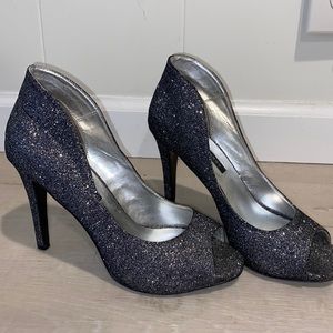Silver sparkly heels.